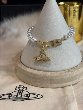 Vivienne Westwood Pearl and Gold Orb Charm Bracelet